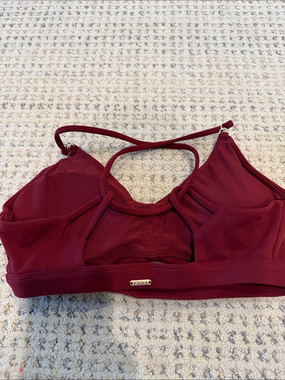 Never worn P'tula Wine burgundy Strappy Sports Bra size small